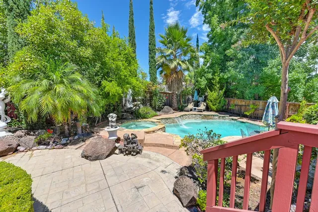 a view of a garden with a fountain