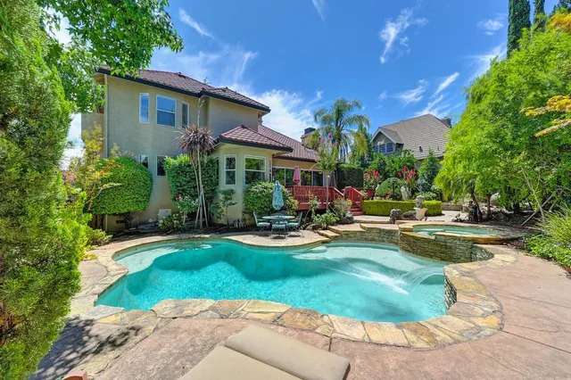 a view of a fountain in a yard