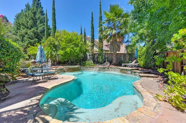 a view of a chairs and tables in patio