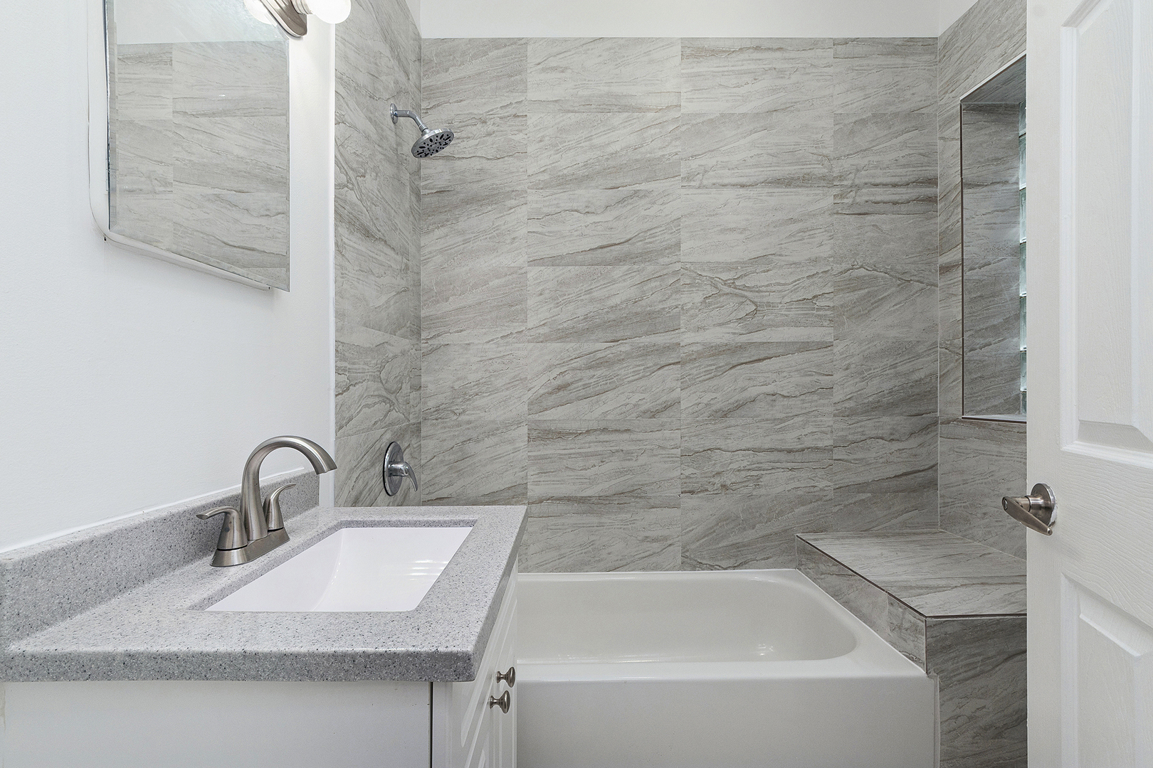 5150 South King Drive, Unit 2A Chicago, IL 60615 - Photo 18 of 22 a bathroom with a sink and mirror