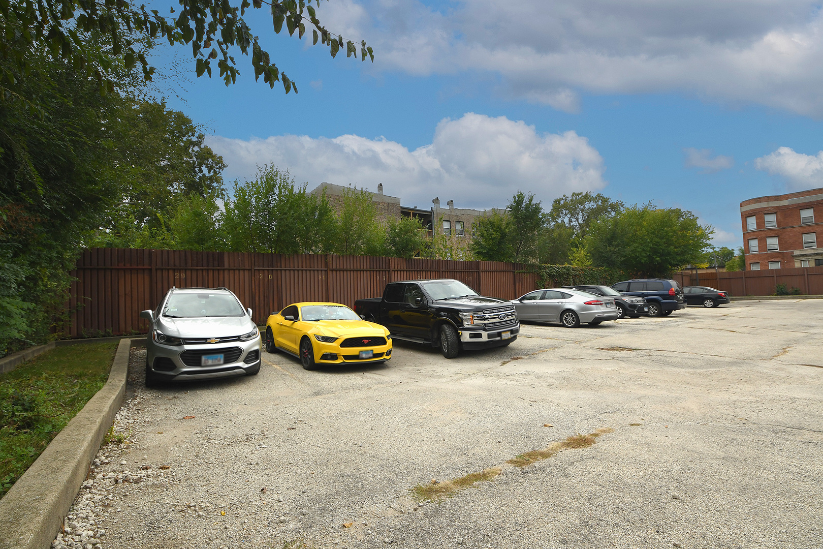 5150 South King Drive, Unit 2A Chicago, IL 60615 - Photo 21 of 22 a car parked in front of a house