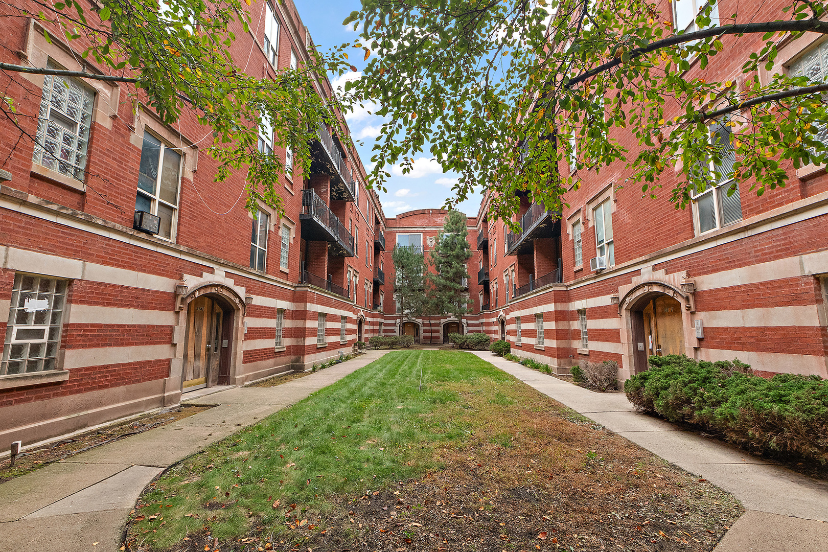 5150 South King Drive, Unit 2A Chicago, IL 60615 - Photo 3 of 22 a front view of a house with garden