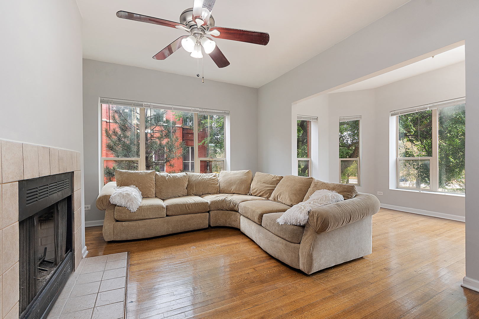 5150 South King Drive, Unit 2A Chicago, IL 60615 - Photo 6 of 22 a living room with furniture and a large window