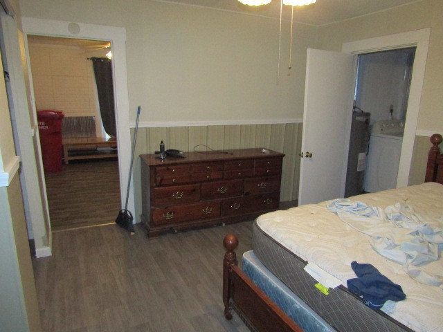 285 East School Street Cave In Rock, IL 62919 - Photo 11 of 20 a bedroom with a bed and a dresser