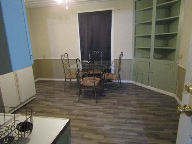 285 East School Street Cave In Rock, IL 62919 - Photo 16 of 20 a dining room with furniture and a fireplace
