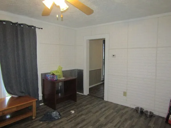 a bed room with a bed and furniture