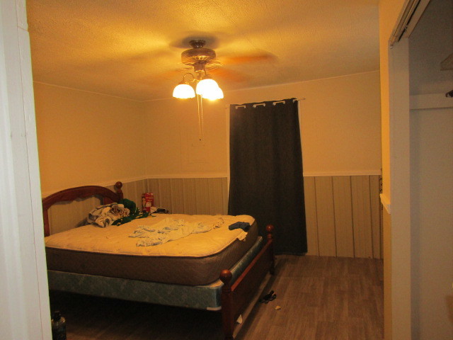 285 East School Street Cave In Rock, IL 62919 - Photo 5 of 20 a bed room with a bed and furniture