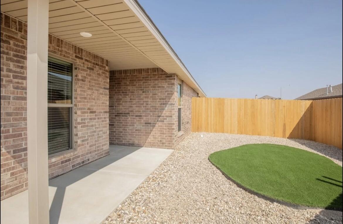 2417 144th Street, Unit B Lubbock, TX 79423 - Photo 13 of 13 a view of outdoor space and yard