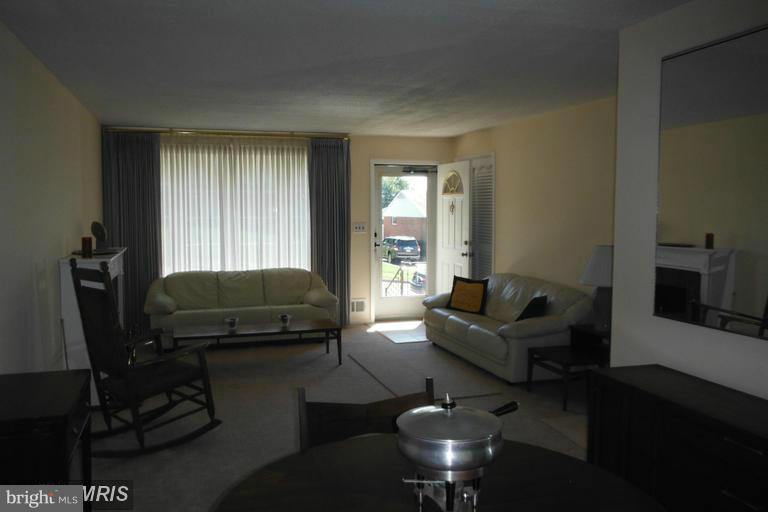 8400 Allison Lane Rosedale, MD 21237 - Photo 11 of 23 a living room with furniture and a window