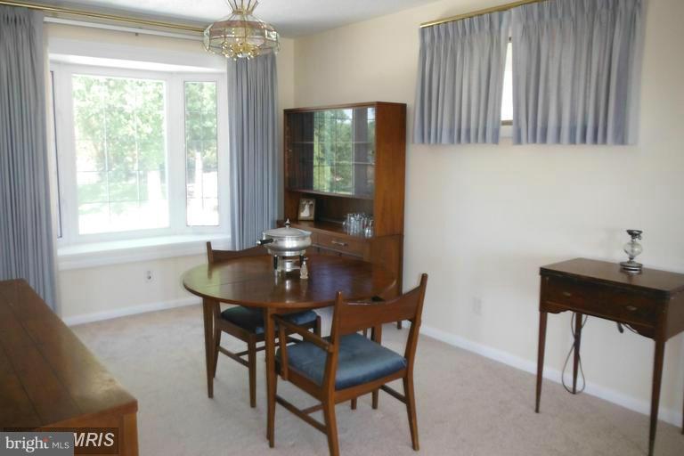 8400 Allison Lane Rosedale, MD 21237 - Photo 13 of 23 a view of a dining room with furniture and window