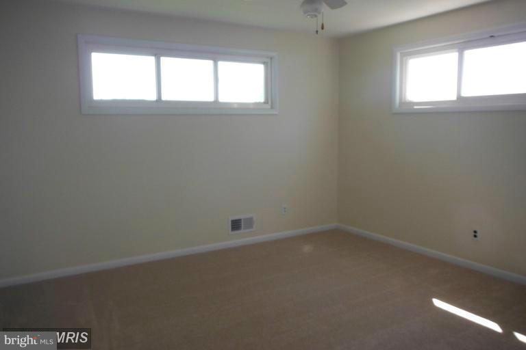8400 Allison Lane Rosedale, MD 21237 - Photo 17 of 23 an empty room with a window