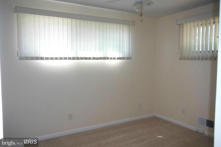 8400 Allison Lane Rosedale, MD 21237 - Photo 18 of 23 an empty room with windows
