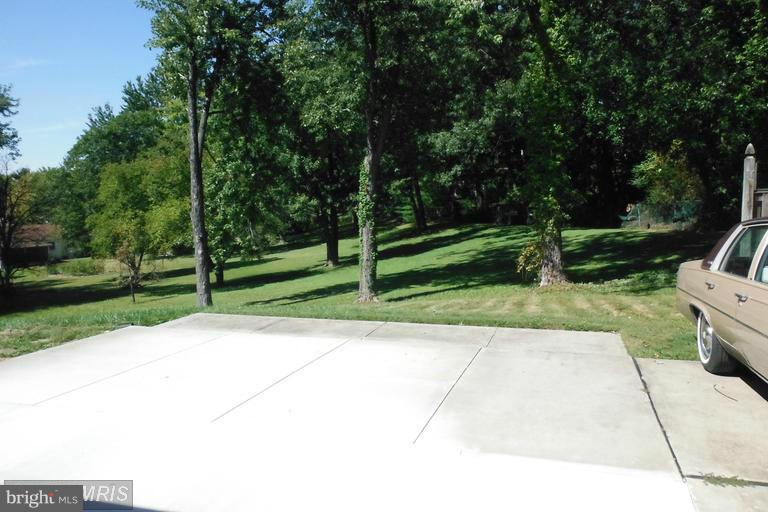 8400 Allison Lane Rosedale, MD 21237 - Photo 23 of 23 a view of backyard with green space