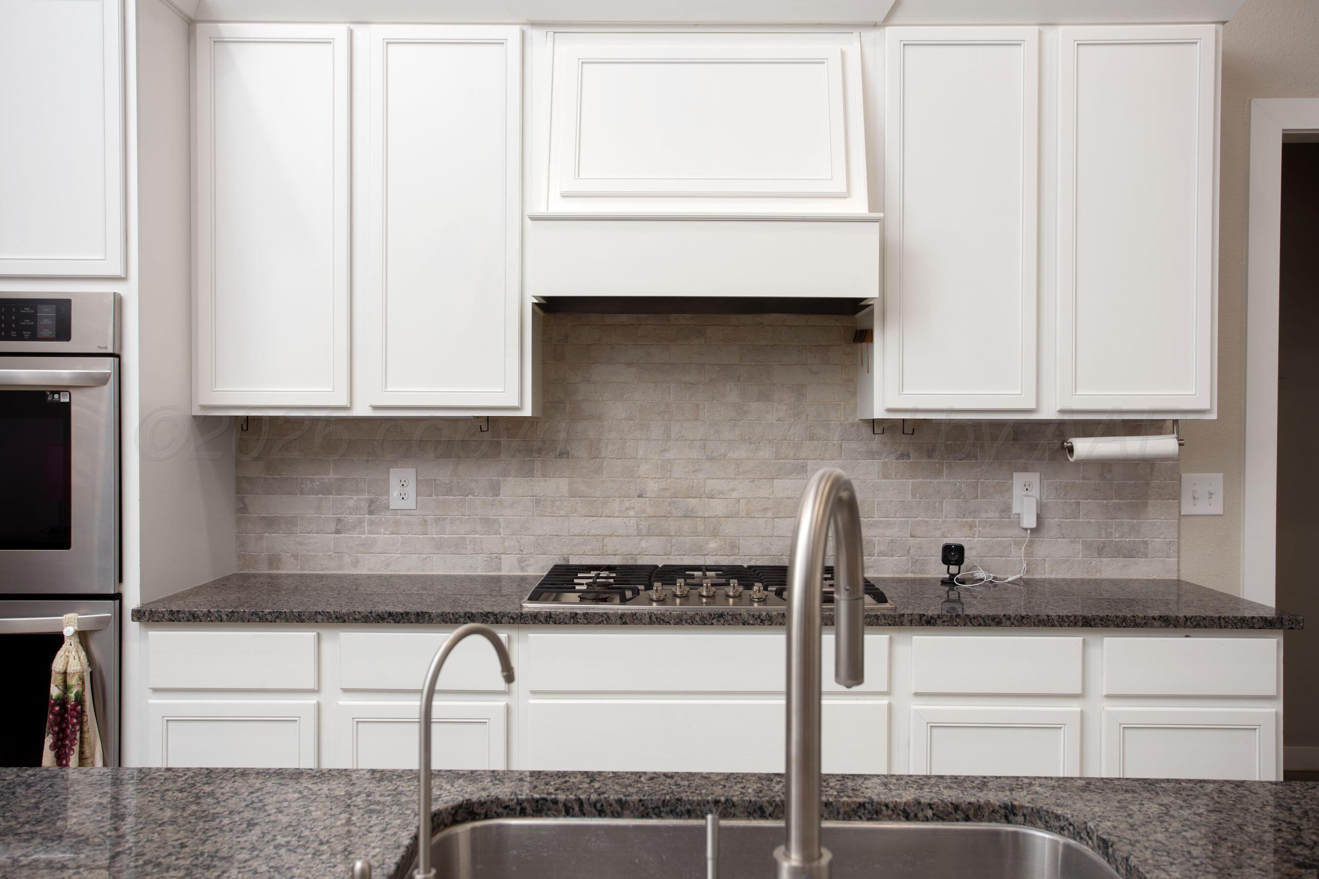 7509 Frazier Road Amarillo, TX 79119 - Photo 9 of 33 Kitchen Sink and Range