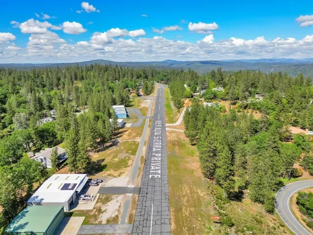 a view of a yard with an outdoor space