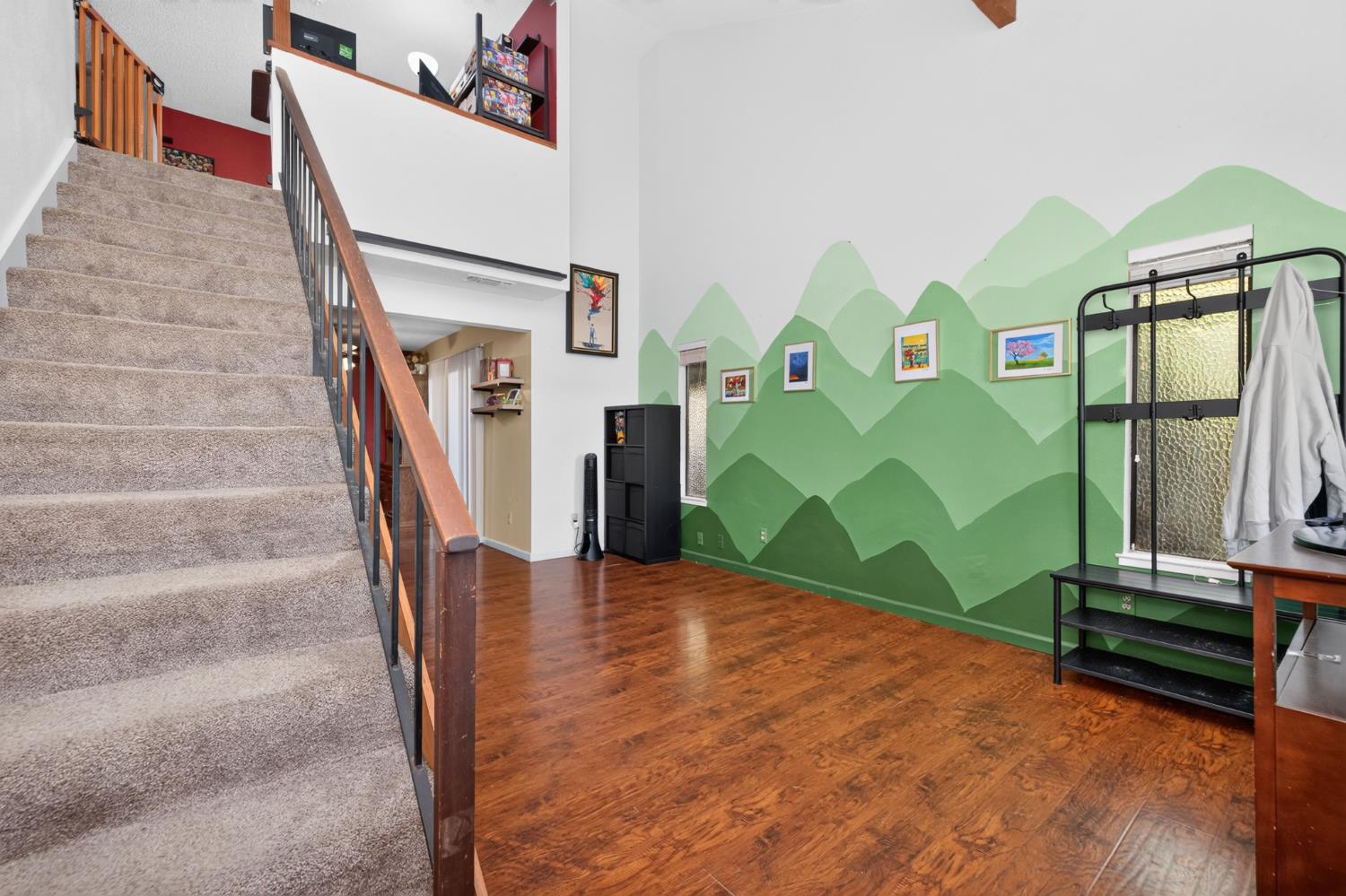 5408 Engle Road Carmichael, CA 95608 - Photo 6 of 21 The downstairs living room - open and bright with a vaulted ceiling and abundant natural sunlight.