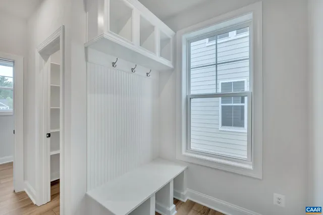 a view of an empty room with a window