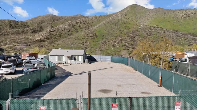 a view of a house with a mountain