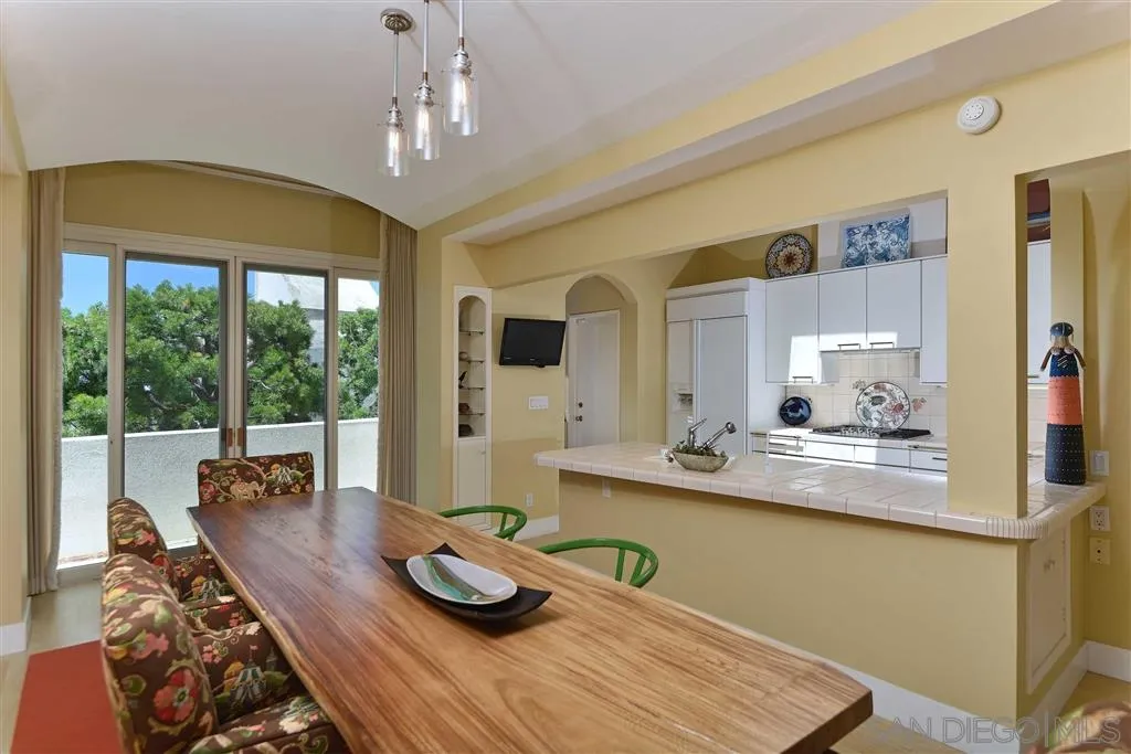 1228 Cave Street La Jolla, CA 92037 - Photo 1 of 22 a dining room with furniture and window