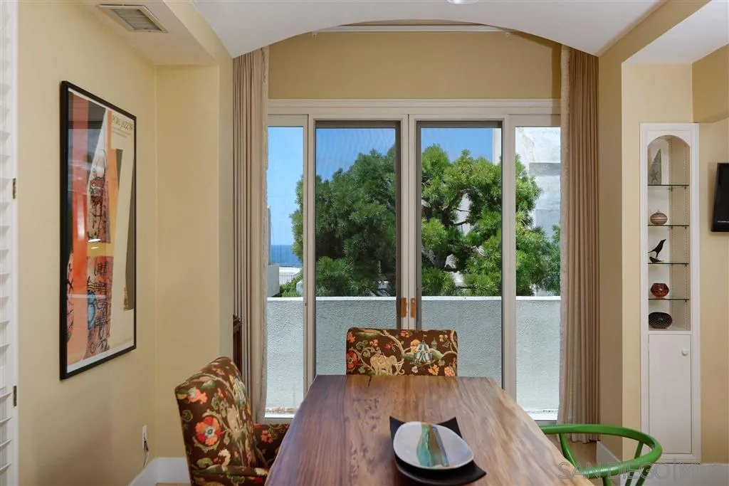 1228 Cave Street La Jolla, CA 92037 - Photo 8 of 22 a living room with furniture and a table