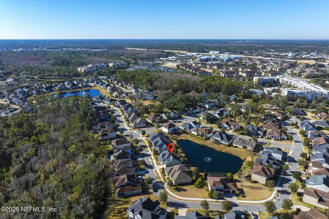 an aerial view of a city with lots of residential buildings
