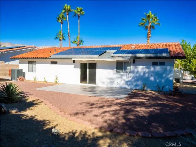 a view of a house with a patio
