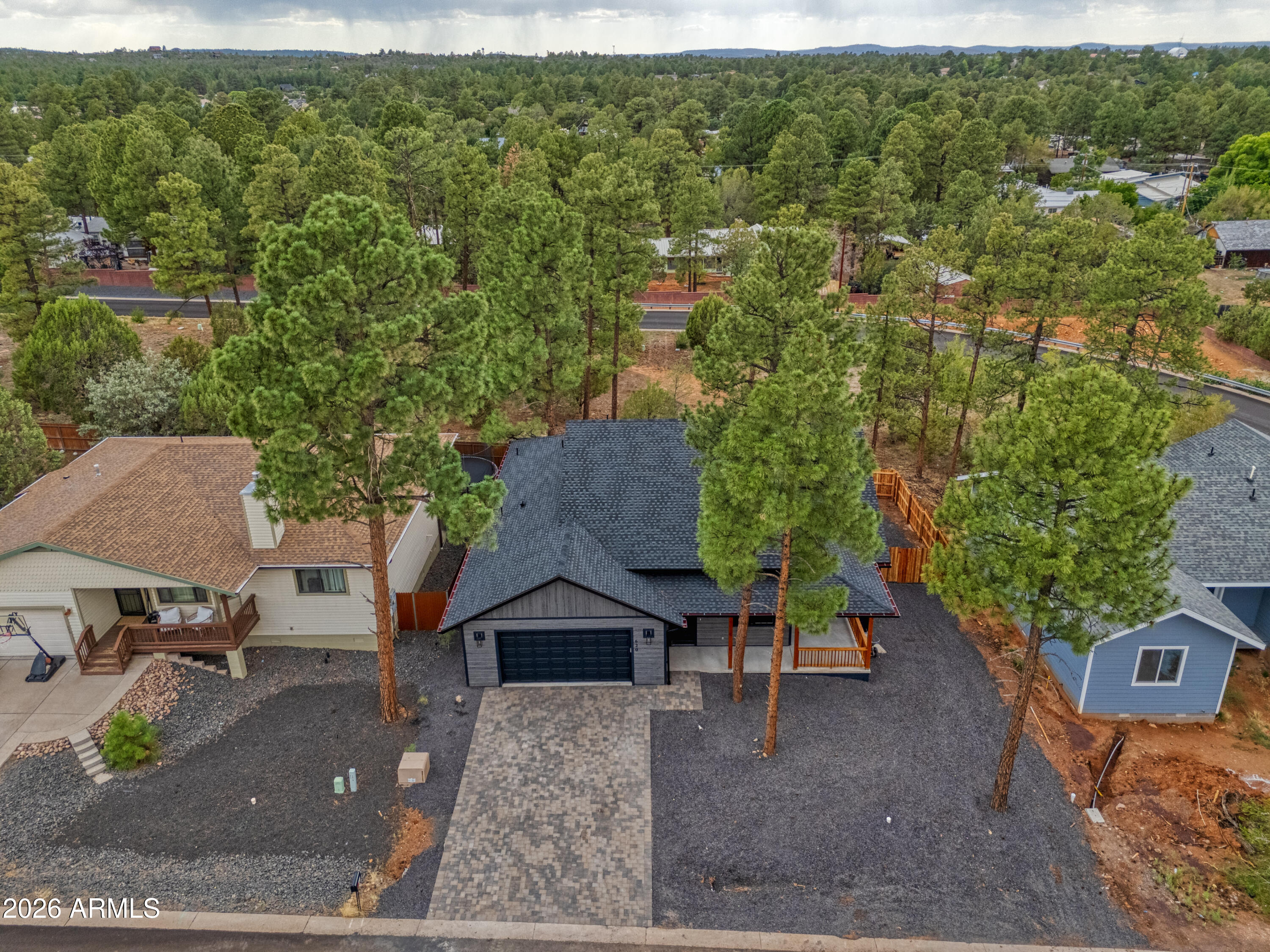 620 Campbell Lane Show Low, AZ 85901 - Photo 30 of 52 an aerial view of a house with a yard