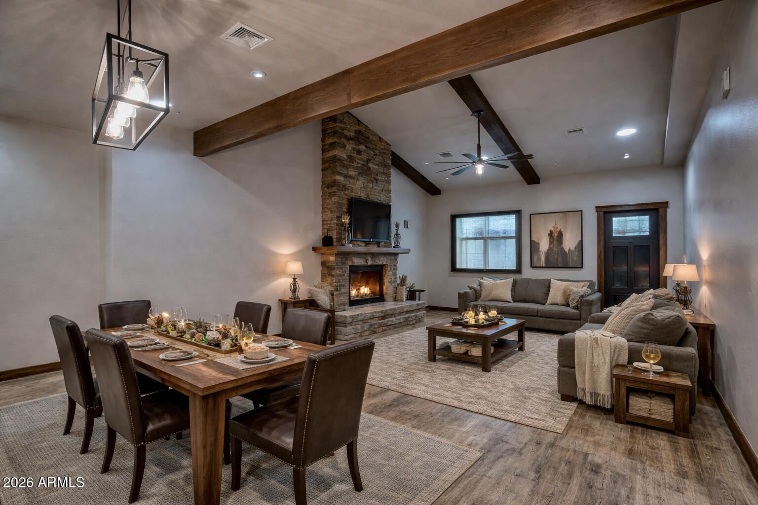 620 Campbell Lane Show Low, AZ 85901 - Photo 4 of 52 a living room with fireplace furniture and a wooden floor