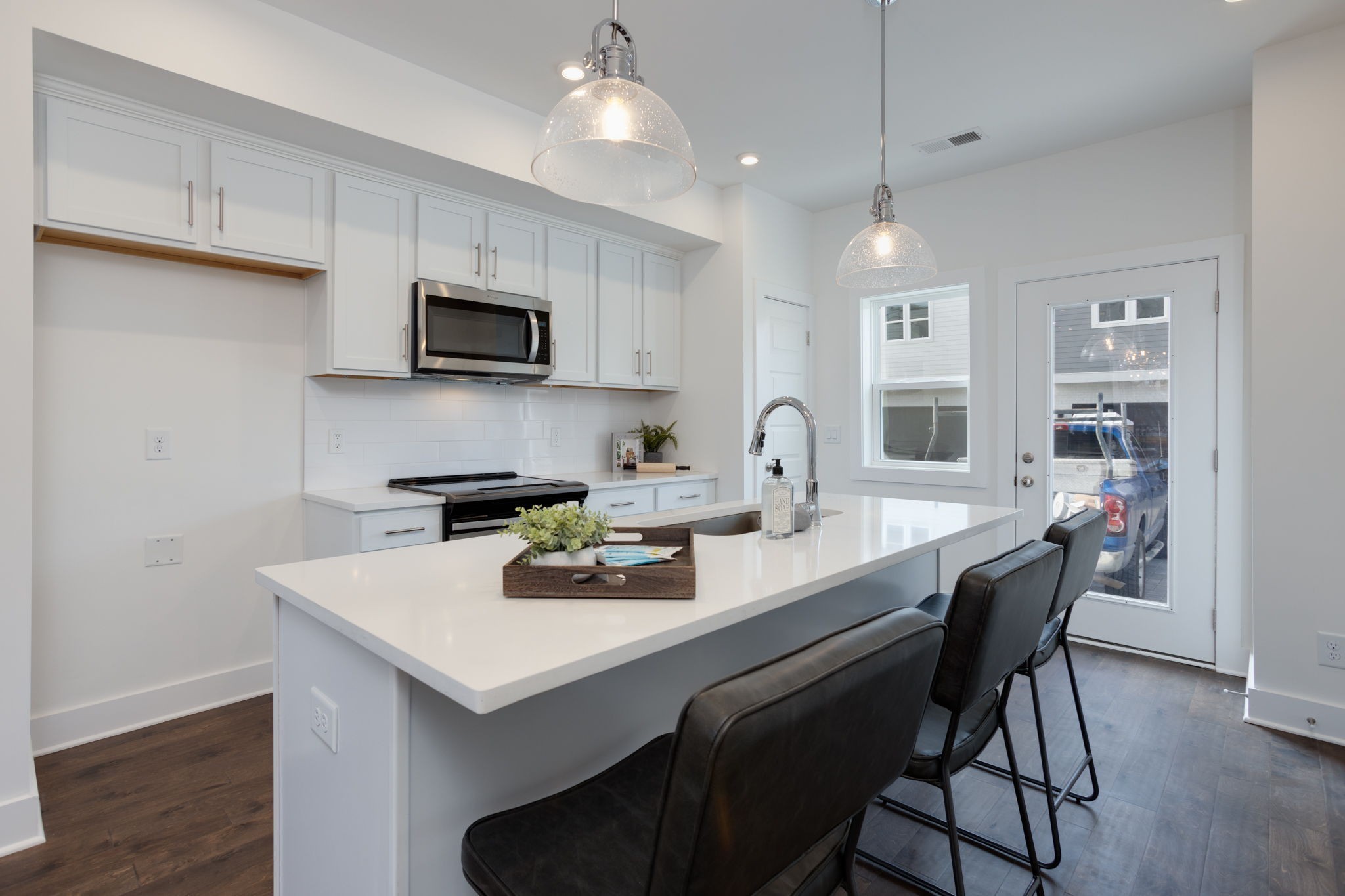 500 Creative Way, Unit 22 Madison, TN 37115 - Photo 1 of 21 a kitchen with a sink a microwave and cabinets