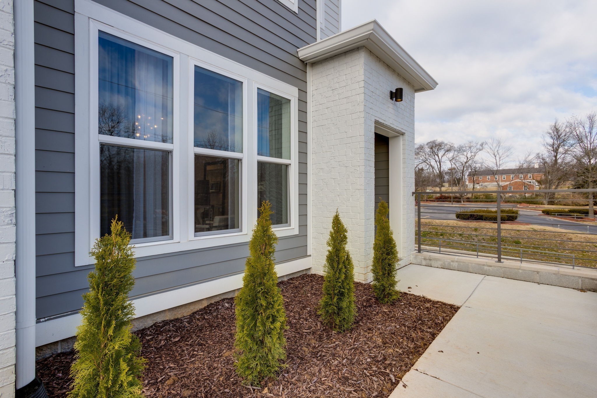 500 Creative Way, Unit 22 Madison, TN 37115 - Photo 2 of 21 a front view of a house with garden