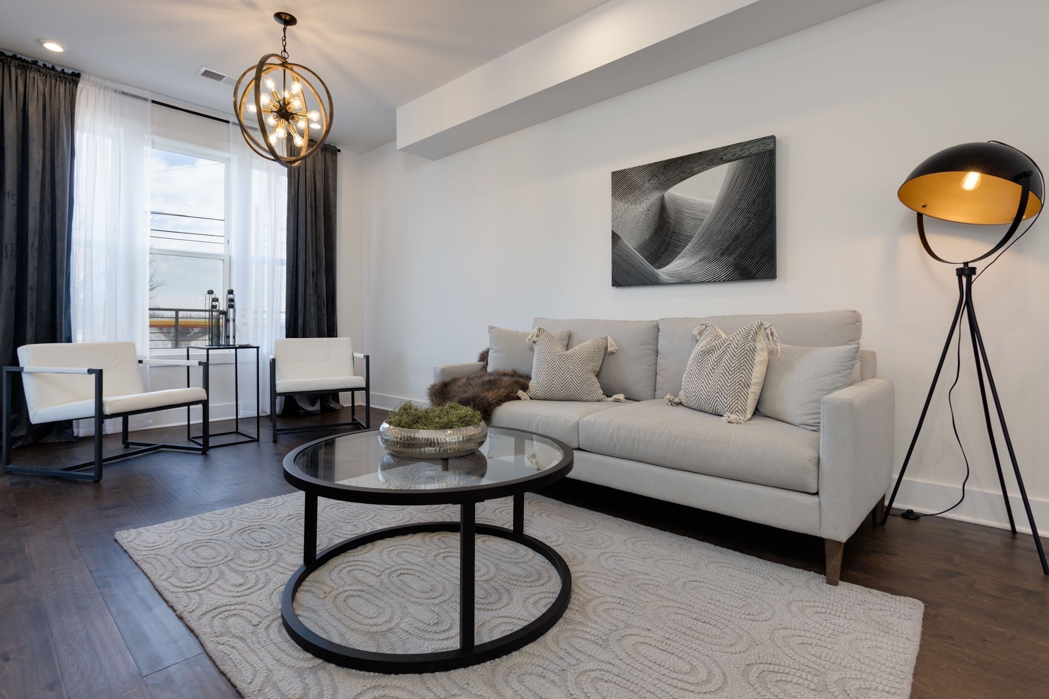 500 Creative Way, Unit 22 Madison, TN 37115 - Photo 11 of 21 a living room with furniture a rug a lamp and a table