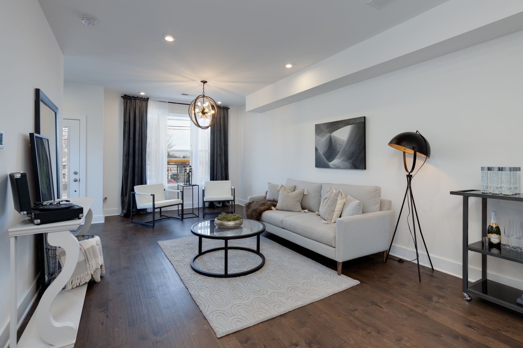 500 Creative Way, Unit 22 Madison, TN 37115 - Photo 13 of 21 a living room with furniture a fireplace and a flat screen tv