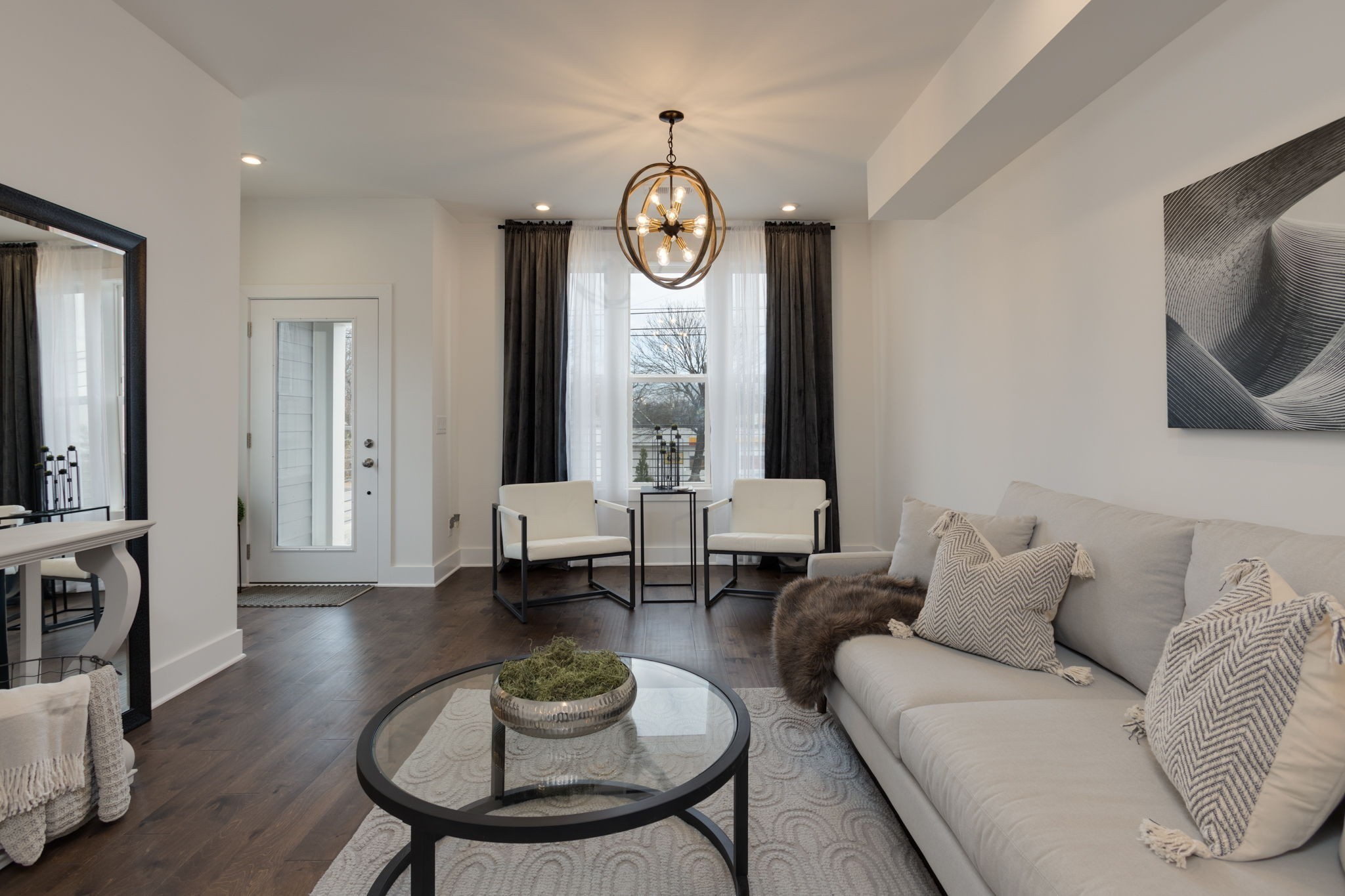 500 Creative Way, Unit 22 Madison, TN 37115 - Photo 14 of 21 a living room with furniture a fireplace and a flat screen tv
