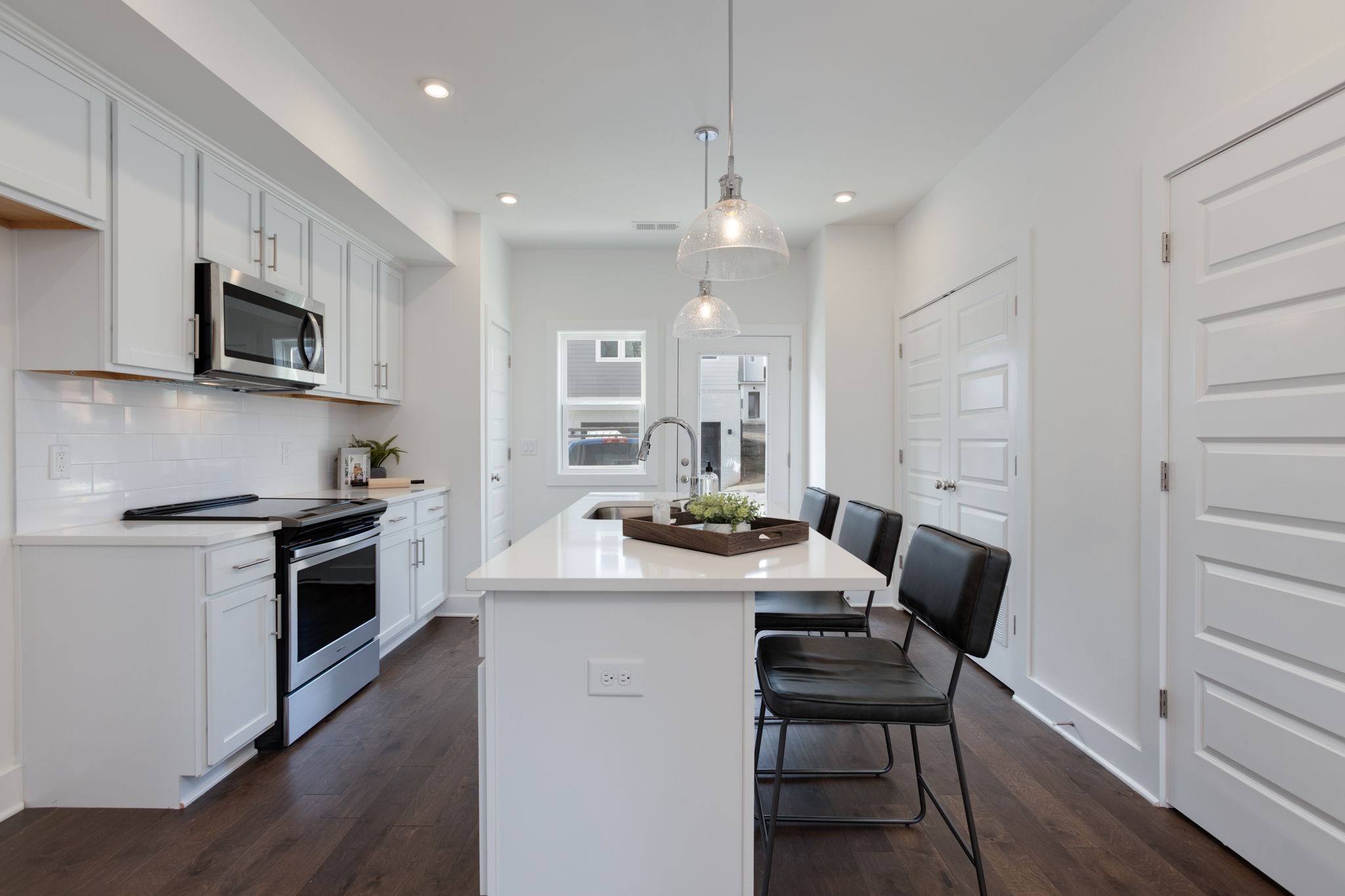 500 Creative Way, Unit 22 Madison, TN 37115 - Photo 16 of 21 a kitchen with a sink cabinets and wooden floor
