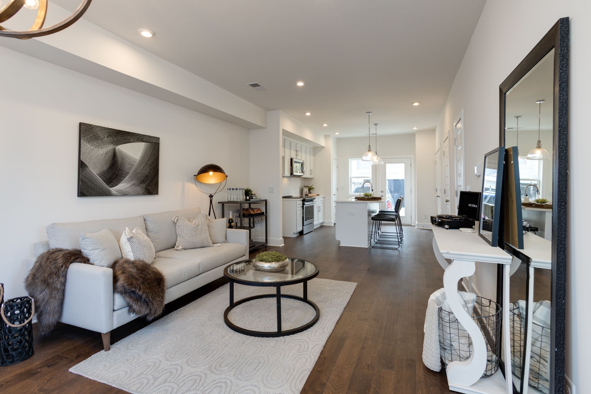 500 Creative Way, Unit 22 Madison, TN 37115 - Photo 3 of 21 a living room with furniture kitchen view and a wooden floor