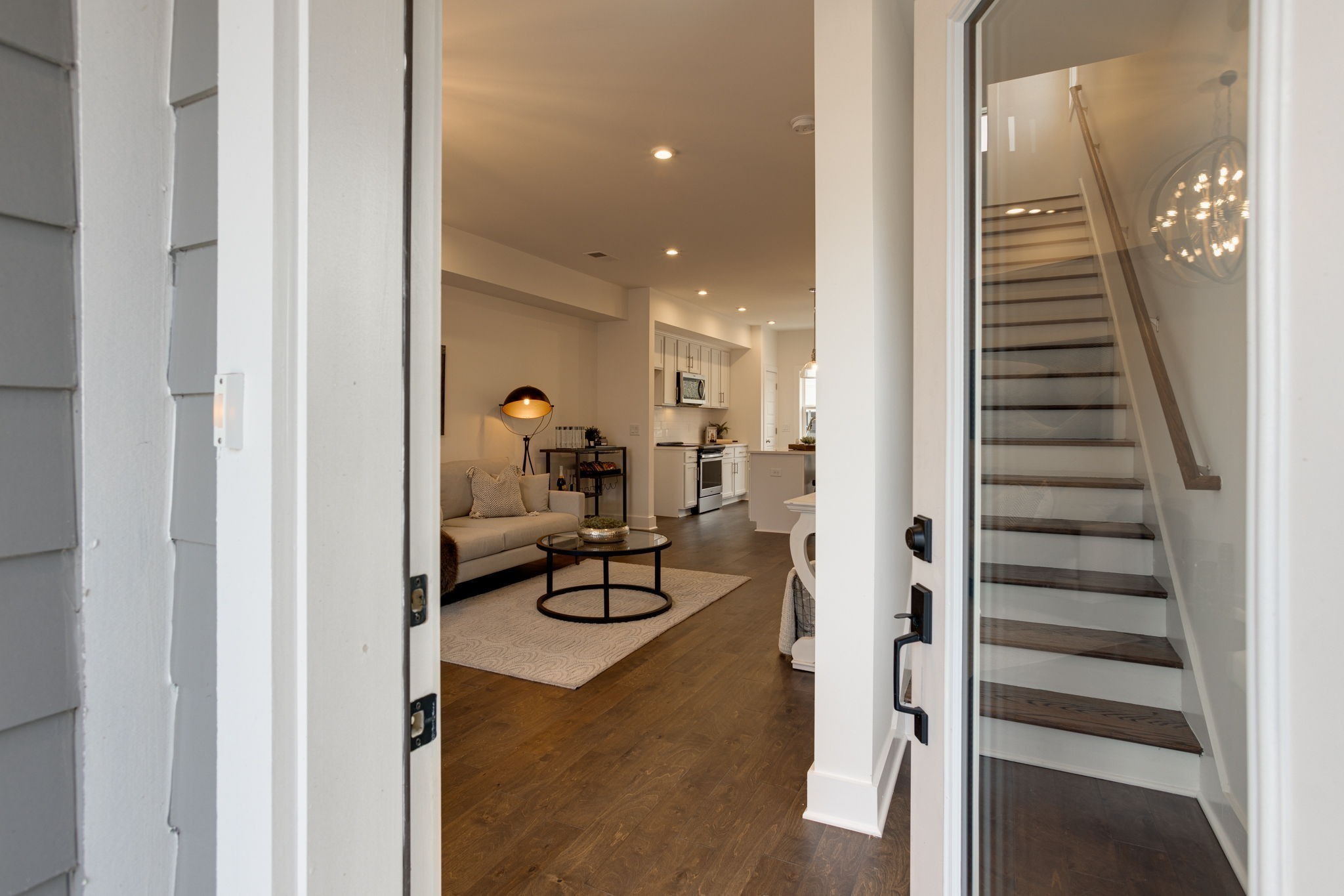 500 Creative Way, Unit 22 Madison, TN 37115 - Photo 6 of 21 a view of a hallway with wooden floor staircase and living room