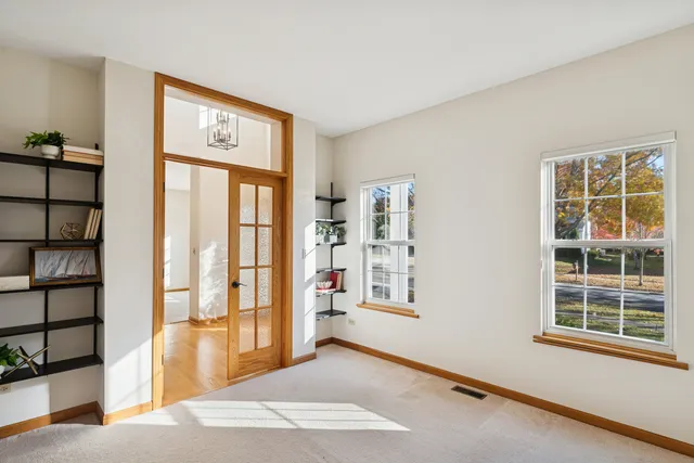 a view of livingroom with furniture and windows
