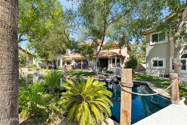a front view of a house with swimming pool