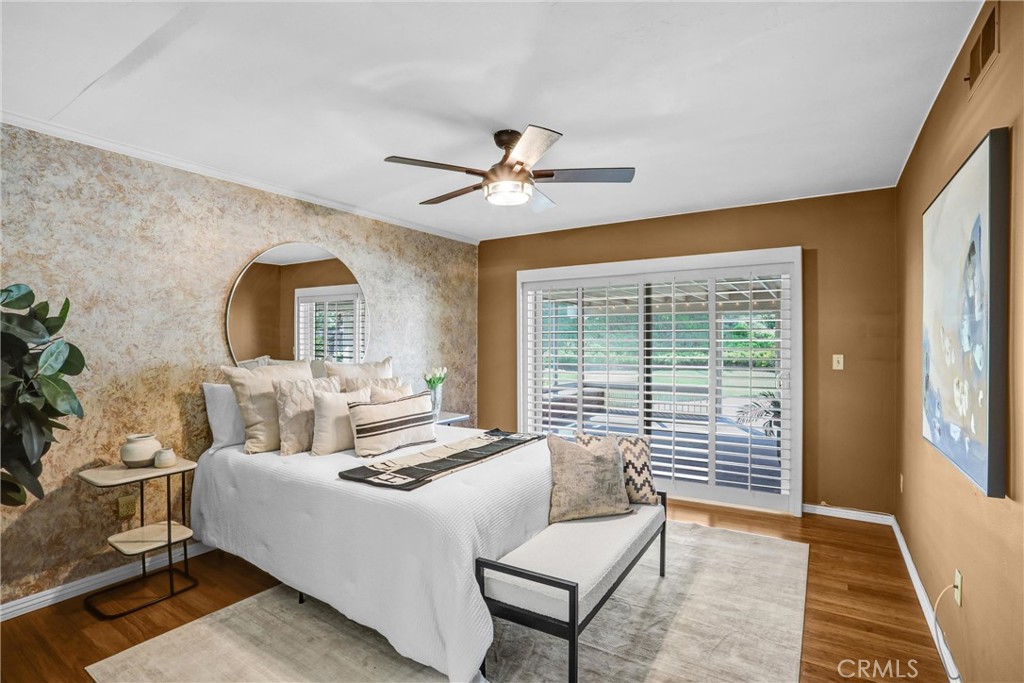 1103 Moonlight Summit Drive Diamond Bar, CA 91765 - Photo 12 of 31 Serene primary retreat with plantation shutters, warm flooring, and a relaxing, elevated feel.