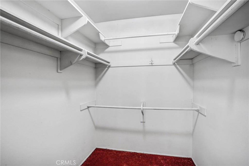 1103 Moonlight Summit Drive Diamond Bar, CA 91765 - Photo 16 of 31 Walk-in closet bonus—ample hanging space and room to stay perfectly organized.