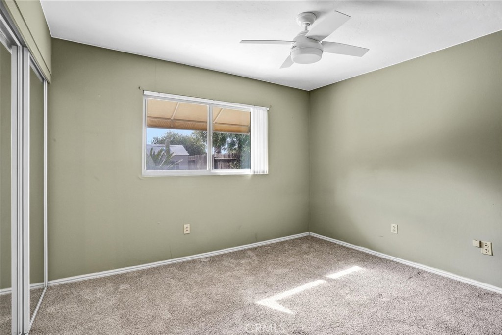 1103 Moonlight Summit Drive Diamond Bar, CA 91765 - Photo 18 of 31 Light-filled secondary bedroom with mirrored closet doors and a clean, airy feel.