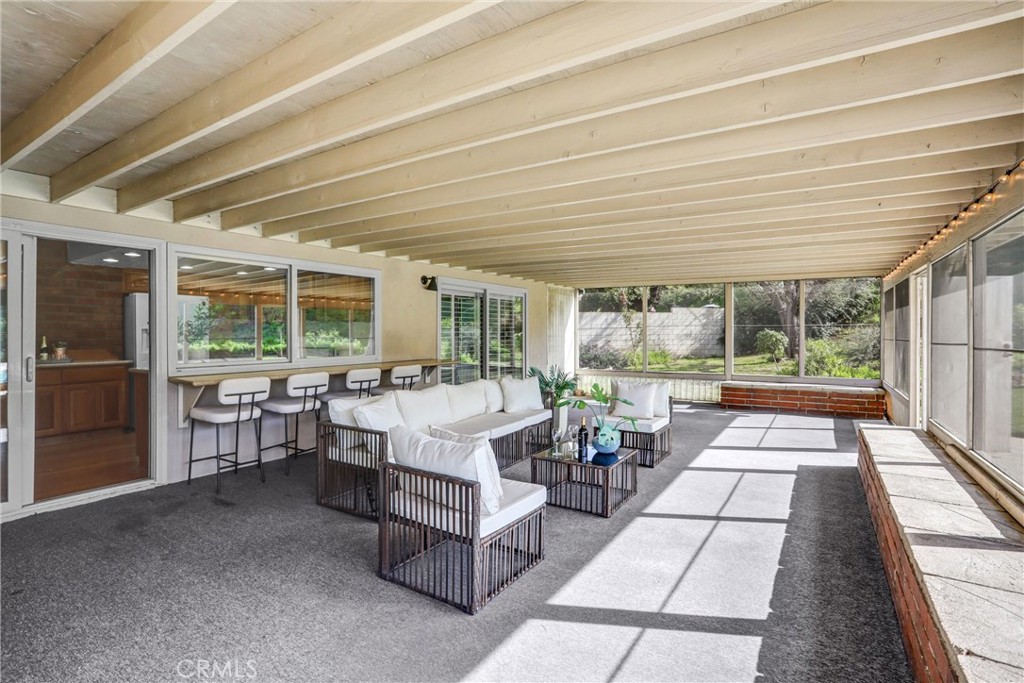 1103 Moonlight Summit Drive Diamond Bar, CA 91765 - Photo 23 of 31 Entertain year round in the oversized screened-in patio with bar seating and pool views.