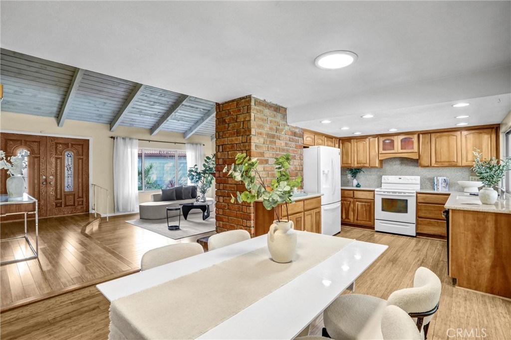 1103 Moonlight Summit Drive Diamond Bar, CA 91765 - Photo 8 of 31 Spacious dining + kitchen connection with sliding doors that invite indoor outdoor living.