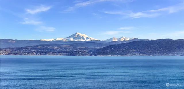 a view of ocean and mountains