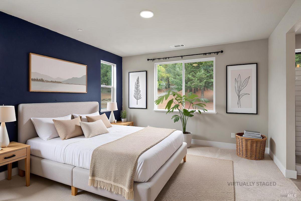 3566 Aaron Drive Santa Rosa, CA 95404 - Photo 12 of 22 a bedroom with a bed and a large window