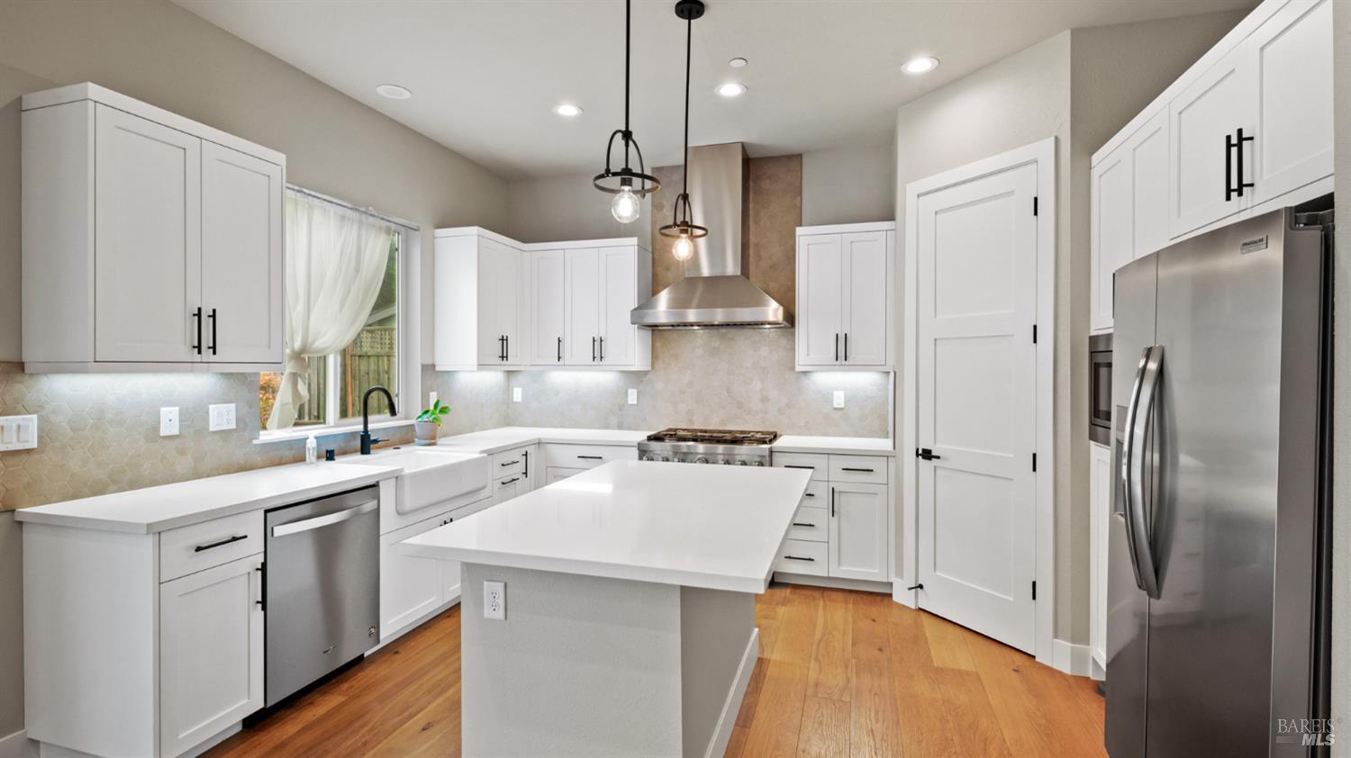 3566 Aaron Drive Santa Rosa, CA 95404 - Photo 7 of 22 a kitchen with a sink stainless steel appliances and cabinets
