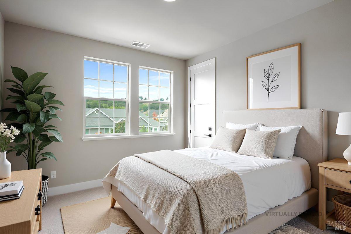 3566 Aaron Drive Santa Rosa, CA 95404 - Photo 10 of 22 a bedroom with bed and a window