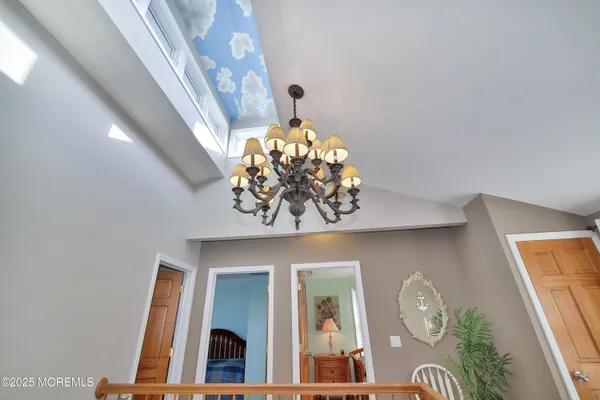 a view of a patio with couple of chairs and couches