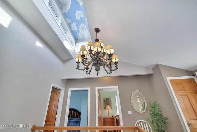 a view of a patio with couple of chairs and couches