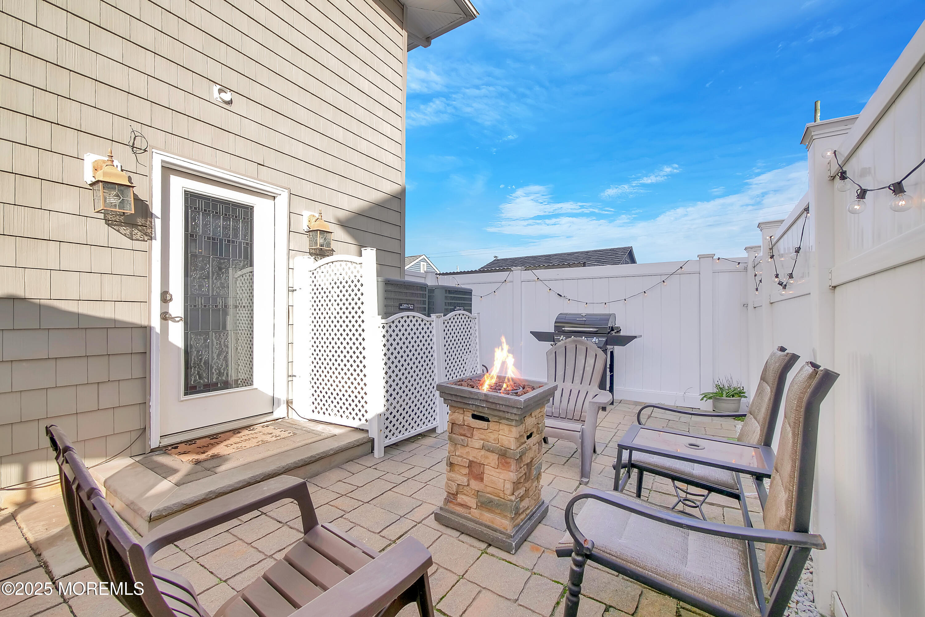 121 3rd Avenue Seaside Heights, NJ 08751 - Photo 17 of 20 a view of a patio with couple of chairs and couches